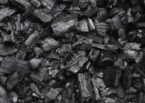 pile of black charcoal