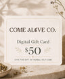 Come Alive Co. $50 digital gift card for herbal self-care, displayed on a cream card with botanical accents, dried herbs, and luxury wellness styling.