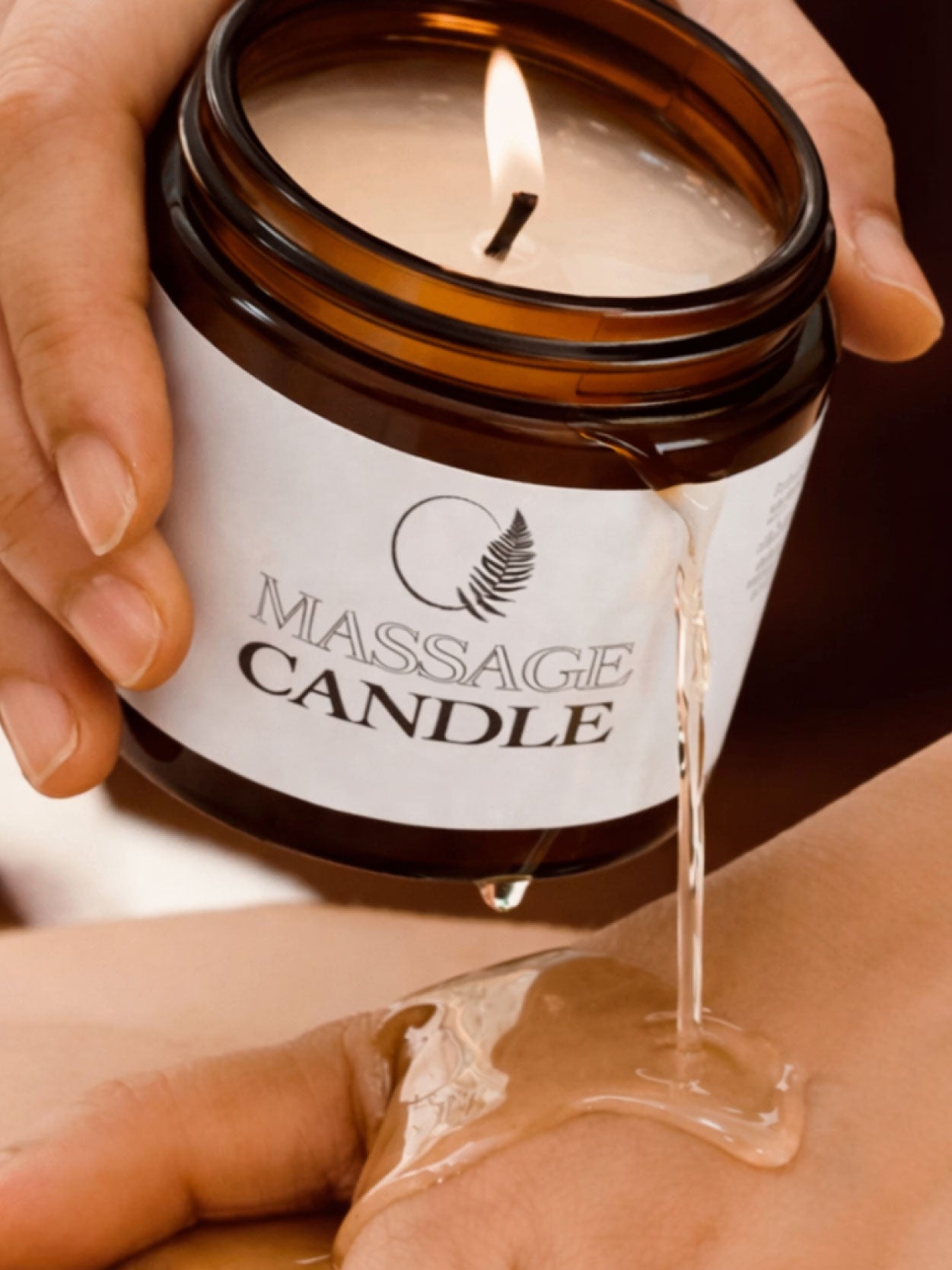 Warm melted Massage Candle oil used for soothing muscle massage and deeply moisturizing the skin